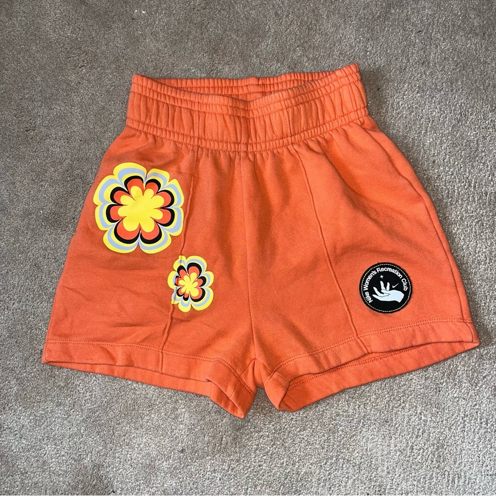 Nike Orange Shorts with Floral Design‎